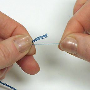Изготовление кисточки - Разделите пряди по одной нити